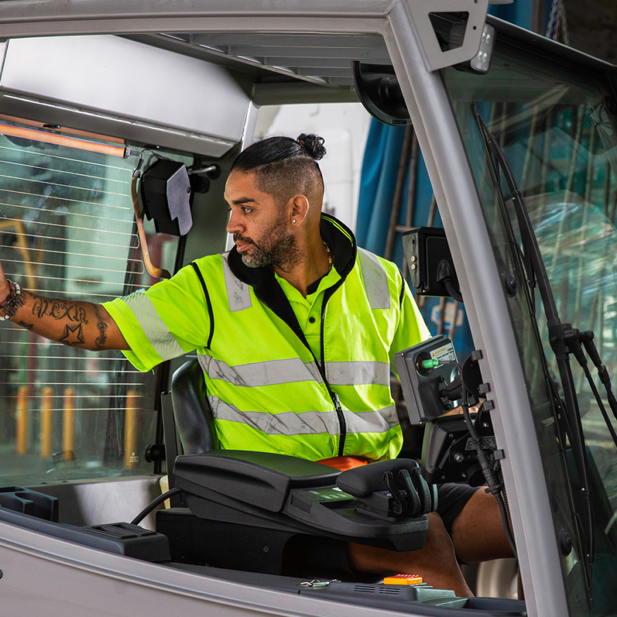 man operating forklift inside a warehouse